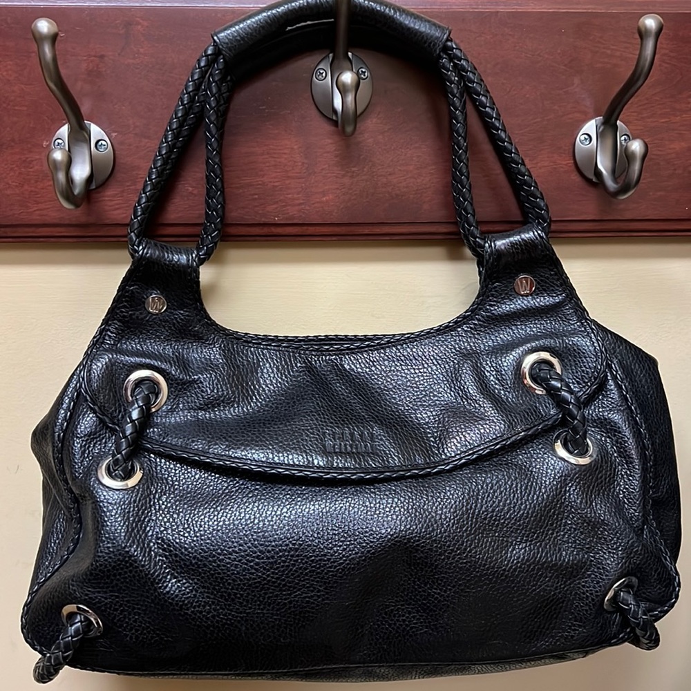 Stuart Weitzman black leather bag zippered pocket on the outside and 3 i…